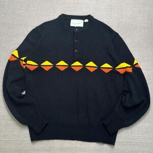 Vintage 70s black button front ski sweater w/ yellow orange zigzag stripes Small